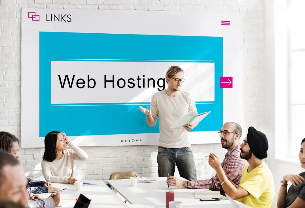 business team at web hosting meeting discussing how to switch website hosting companies and not hurt seo.