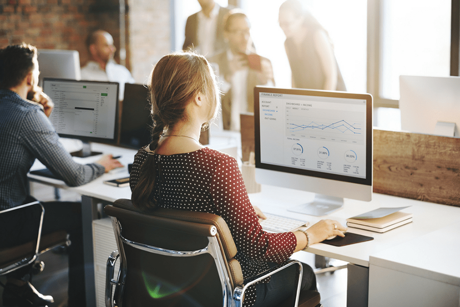 dedicated team of experts working together on their computers, actively engaged in the ongoing maintenance and management of websites.