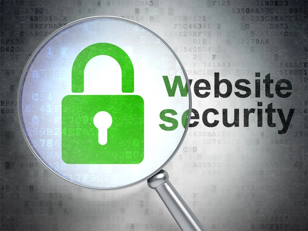 looking glass over the padlock icon scrutinizing wordpress security vulnerabilities from brute force attacks.