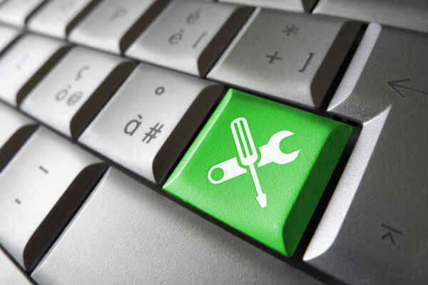 Tools icon on keyboard concept image for maintenance of your multilingual website