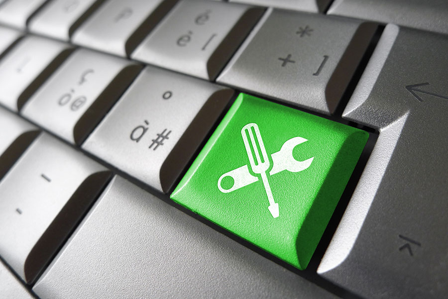 tools icon on keyboard concept image for maintenance of your multilingual website