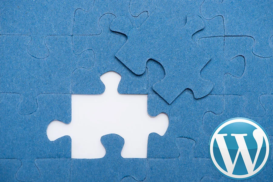 top view of one puzzle missing concept image for how to test wordpress plugin compatibility