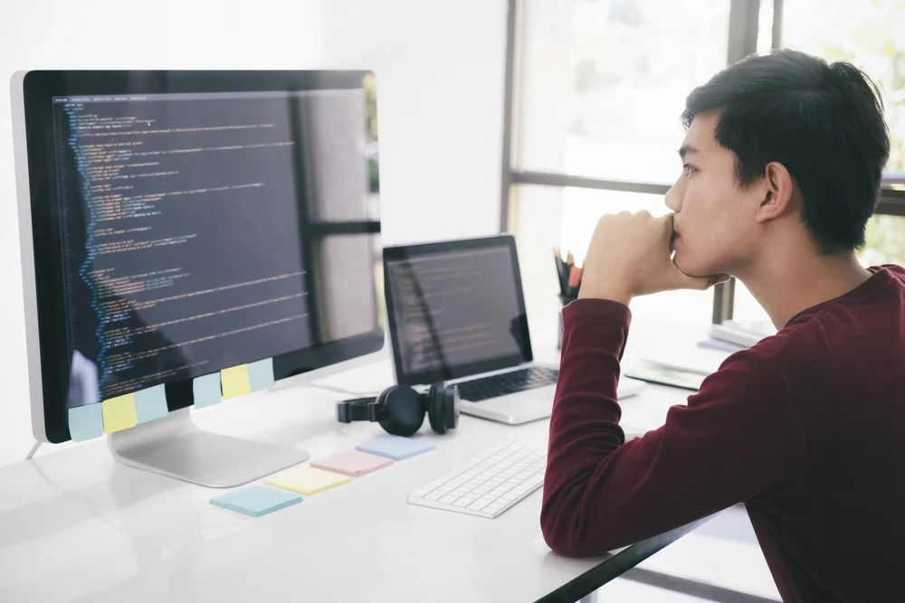 A Website Developer Working On A Shopify To Wordpress Migration As Well As Transfering The Shopify Shop To Woocommerce concept image for a website development team working on a squarespace to wordpress migration project