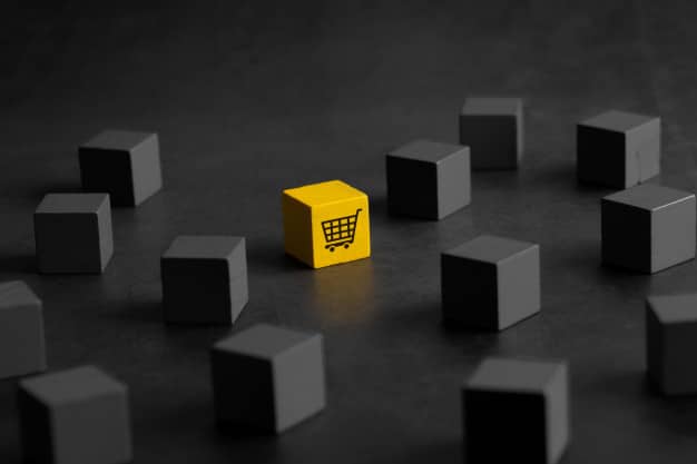 Shopping cart on cube concept image for ease of use of most popular eCommerce platforms.