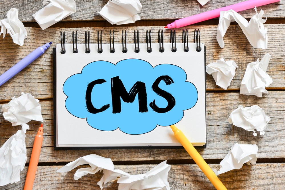 CMS lettering on a notebook 